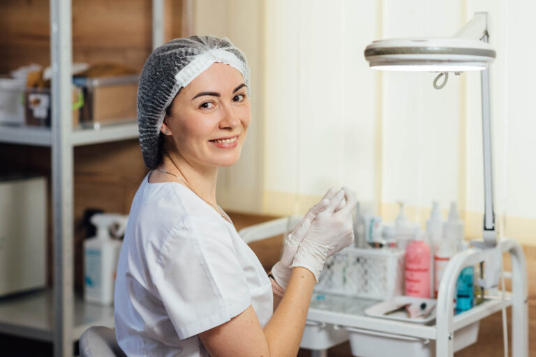 Beautiful,Woman,Doctor,In,Mask,On,Face,,Smiling,And,Putting