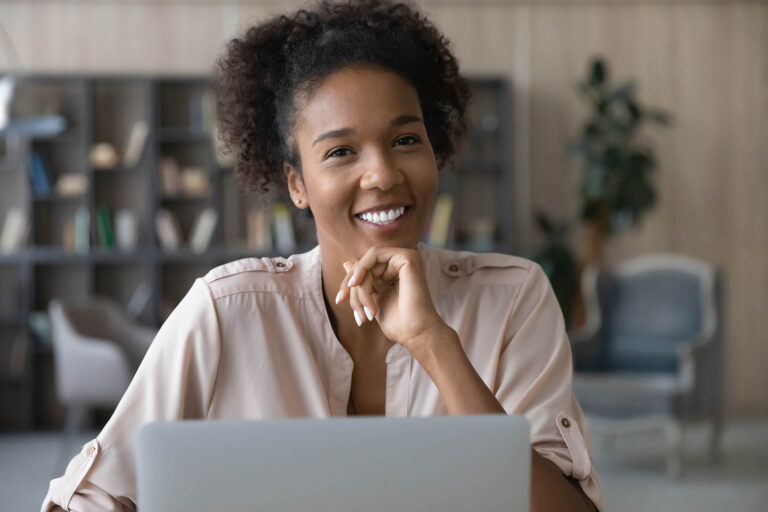 Head,Shot,Portrait,Smiling,African,American,Attractive,Woman,Using,Laptop,