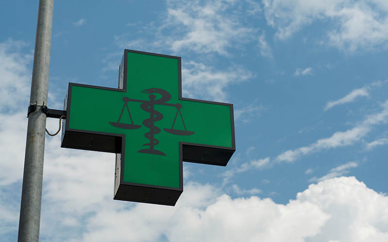 A,Generic,Pharmacy,Logo,Against,A,Blue,Sky,In,Lugano,