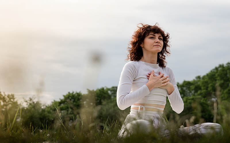 Lady,Practicing,Diaphragmatic,Breathing,In,The,Morning.,Sports,Woman,Doing