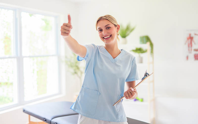 A,Portrait,Of,A,Physiotherapy,Woman,Smiling,In,Uniforme